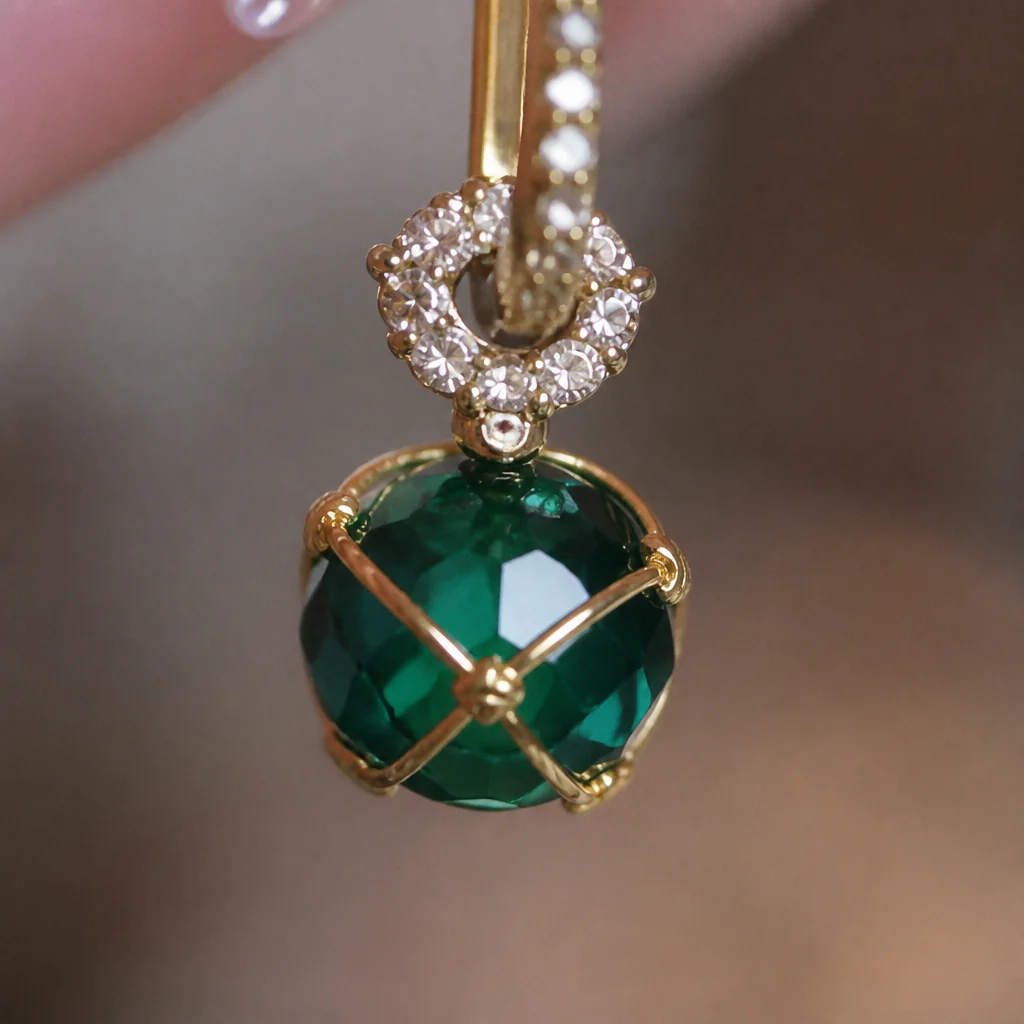 SolaraLuxe™ – Pavé Gold Hoop Earrings with Emerald Crystal Drop - Image 4